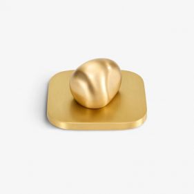 LIBRARY PEBBLE CANDLE LID: ASSOULINE - أغطية ومقابض